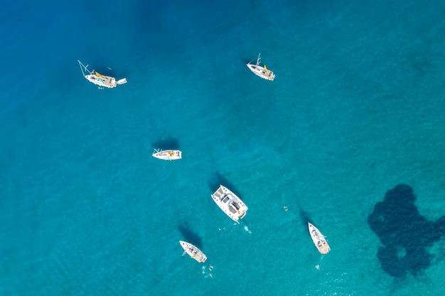 Yacht sailing near the rocky coast in Turkey Luxury vacation at sea