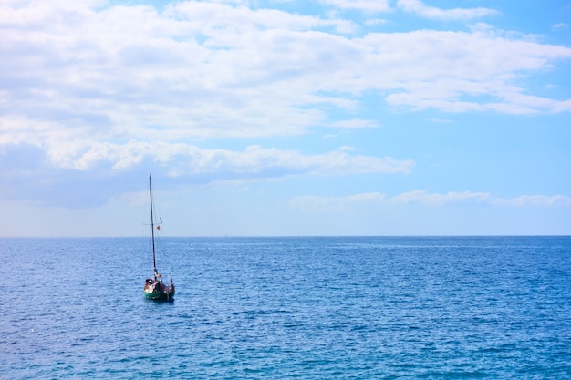 Yacht in the sea on the summer day - seascape