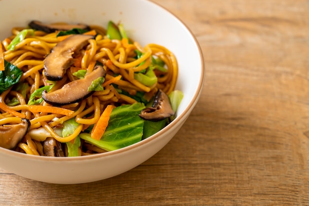 yakisoba noodles stir-fried with vegetable in asian style - vegan and vegetarian food