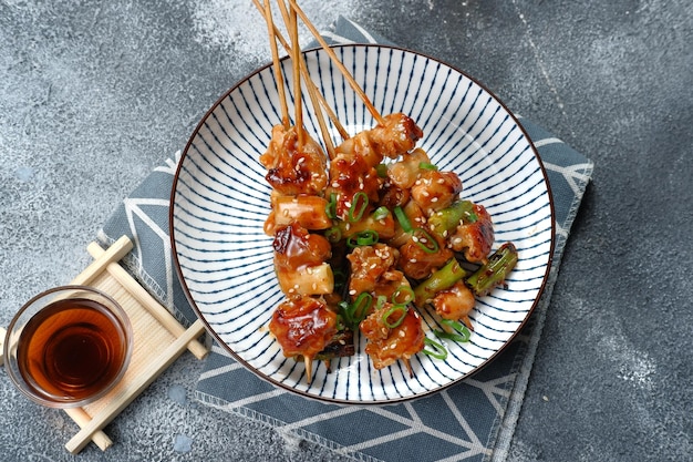 yakitori japanese grilled chiken, close up of chicken yakitori