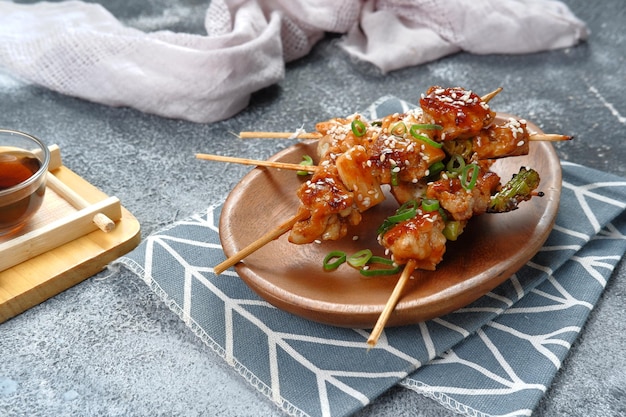 yakitori japanese grilled chiken, close up of chicken yakitori