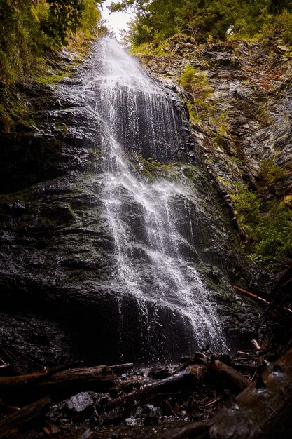 Yalynskiy waterfall in Marmaros region Carpathian Mountain Ukraine Walking and hiking trails in Marmaros ridge Rural area of carpathian mountains in autumn