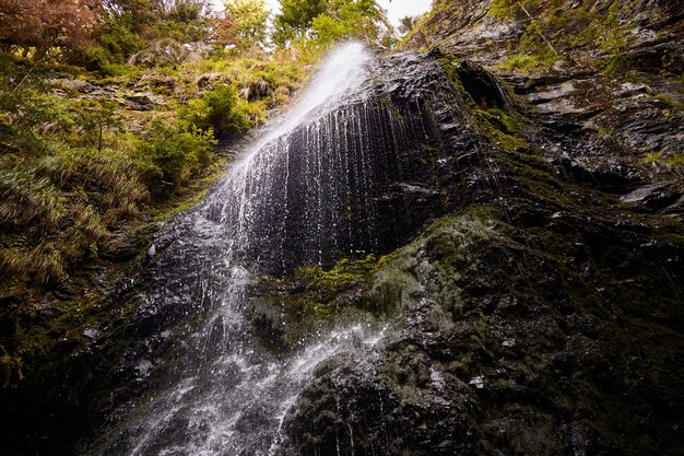 Yalynskiy waterfall in Marmaros region Carpathian Mountain Ukraine Walking and hiking trails in Marmaros ridge Rural area of carpathian mountains in autumn