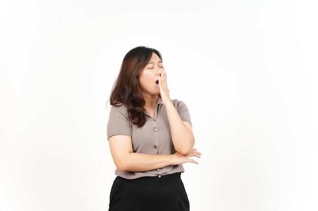 Yawning Gesture Of Beautiful Asian Woman Isolated On White Background