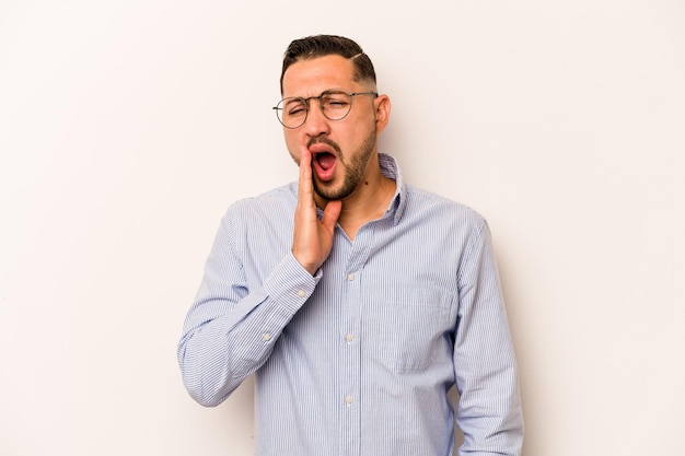 Yawning showing a tired gesture covering mouth with hand