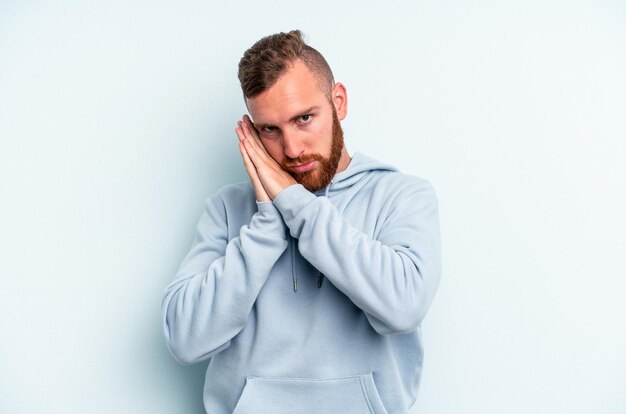 Yawning showing a tired gesture covering mouth with hand