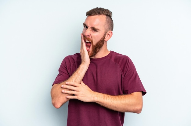 Yawning showing a tired gesture covering mouth with hand