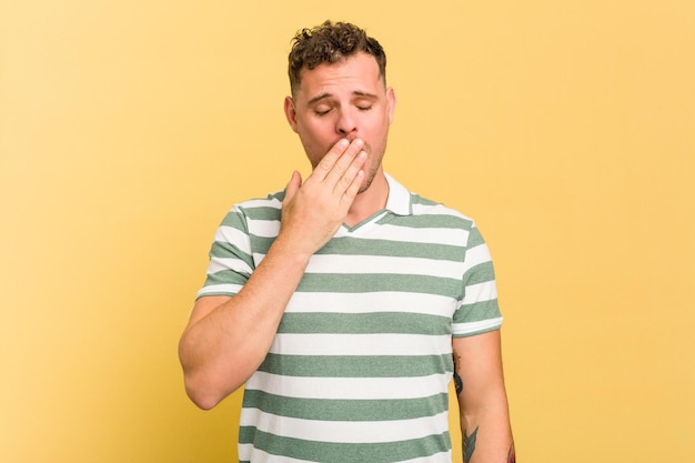 Yawning showing a tired gesture covering mouth with hand