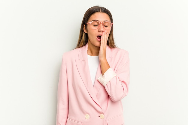 Yawning showing a tired gesture covering mouth with hand