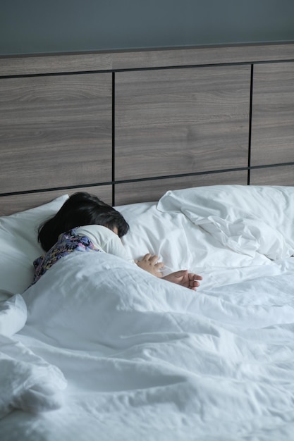 year old child girl sleeping on bed