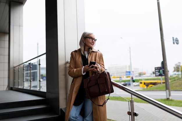 year old female lawyer waiting for a client for a meeting near the business center