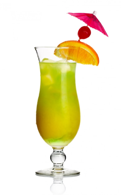 Yellow alcohol cocktail with orange slice and cherry isolated