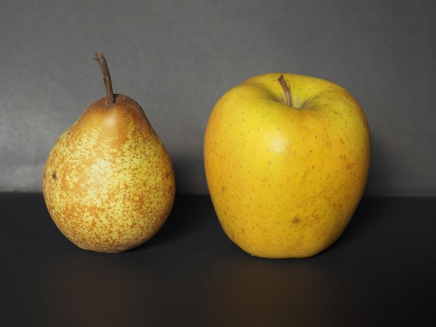 Yellow apple and pear fruit