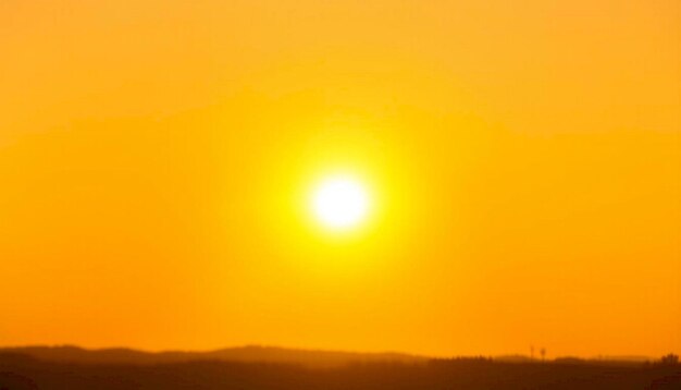 Photo yellow background with bright white sun shining rays