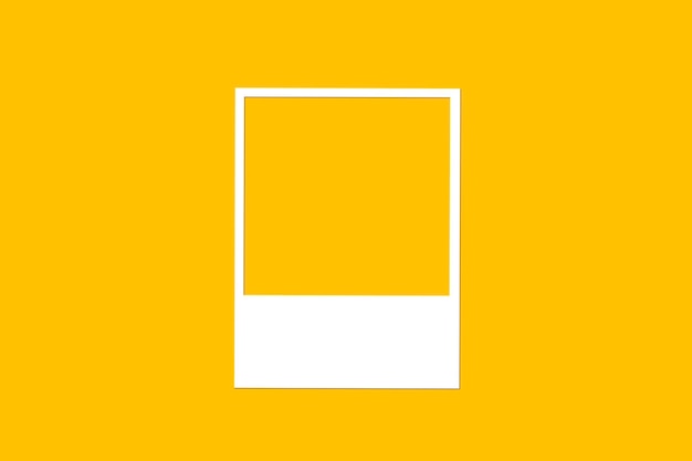 A yellow background with a white frame in photo shape with copyspace