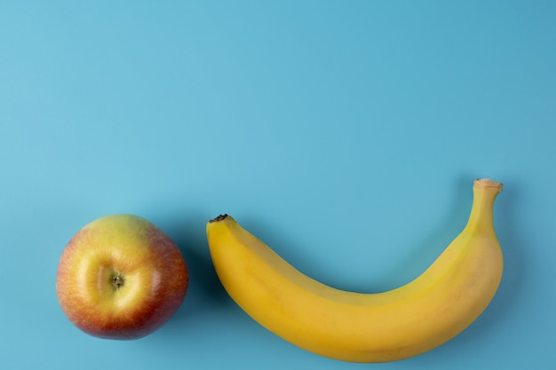 Yellow banana and  Apple.