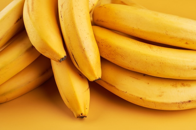 Yellow bananas close up background