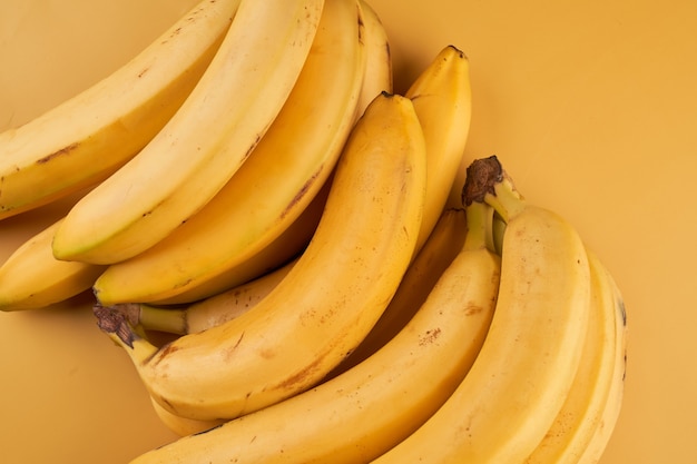 Yellow bananas close up background