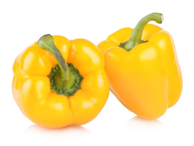 Yellow bell peppers isolated on white background