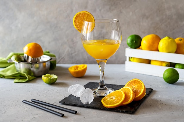 Yellow bird cocktail with rum orange and lime juice ice