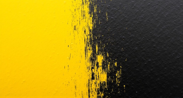 Photo yellow and black paint with a black background