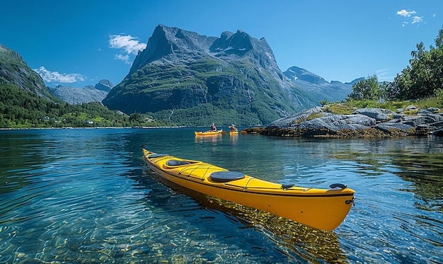 a yellow boat with a red kayak in the water