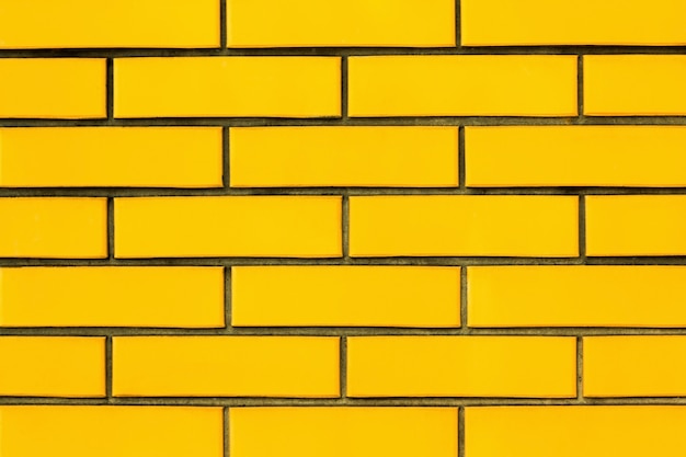 Yellow brick wall texture background