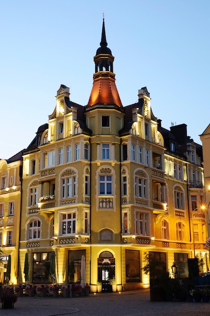 The yellow building in the center of Boleslawiec The Polish city of Boleslawiec in the evening