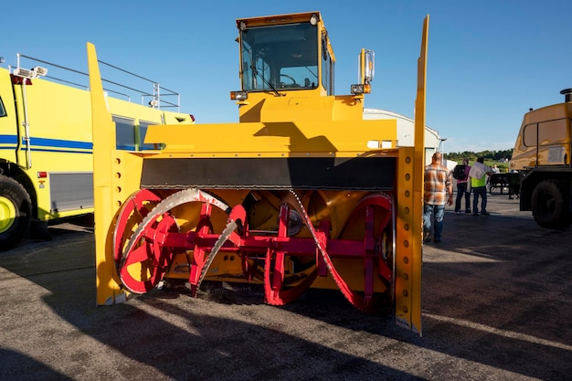 A yellow bulldozer with the word big on the front.