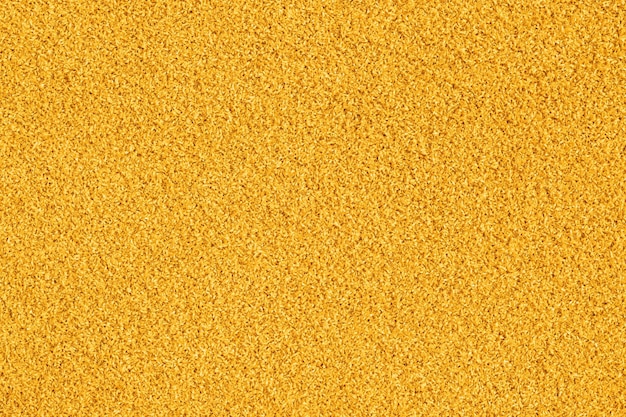 Yellow carpet background closeup