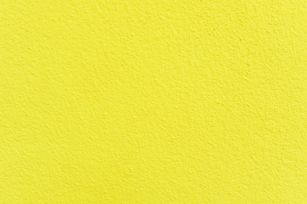 Yellow cement surface for background , Concrete wall.