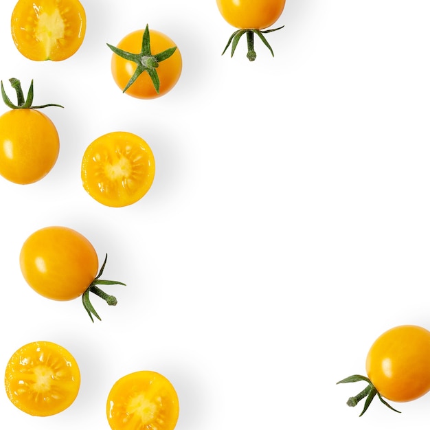 Yellow cherry tomatoes on white background