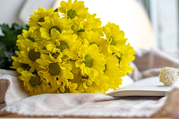 Yellow chrysanthemums in a bouquet on a different background. High quality photo