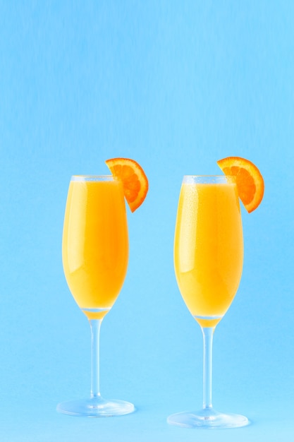 Yellow cocktail on a bright background