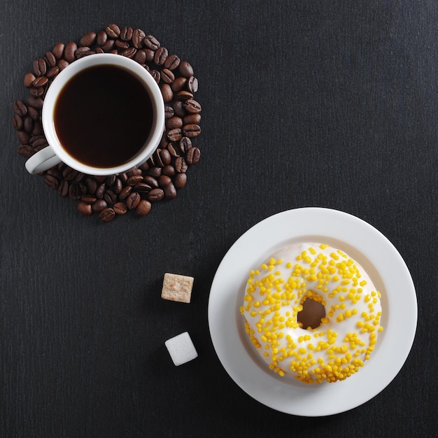 Yellow donut and coffee