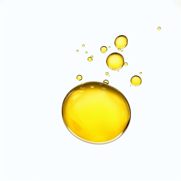 A yellow drop of oil is in the air and the air is surrounded by the air bubbles.