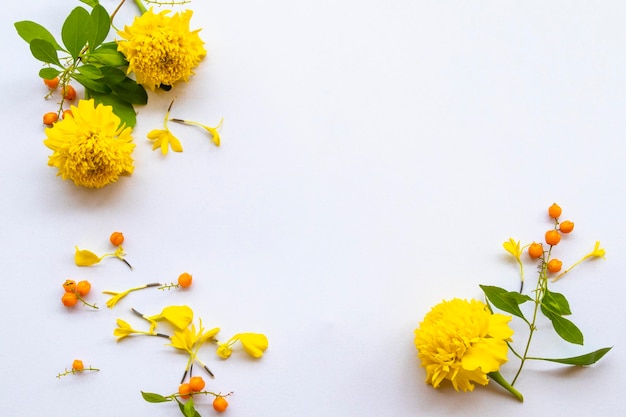 yellow flowers marigold arrangement flat lay postcard style