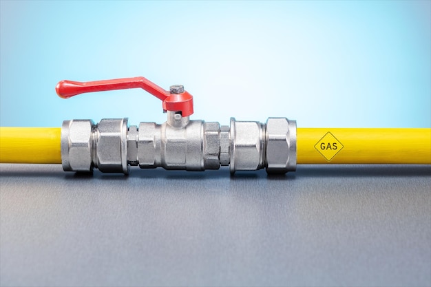 Yellow gas pipe with valve Gas transportation system Concept of gas consumption crisis price with copy space