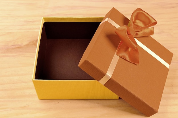 yellow gift box on the table