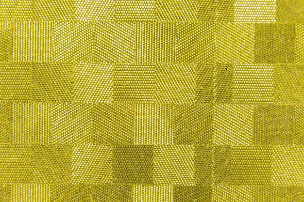 Yellow golden checkered shiny paper background