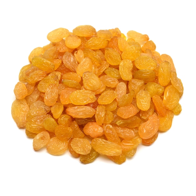 Yellow golden raisins isolated on white background