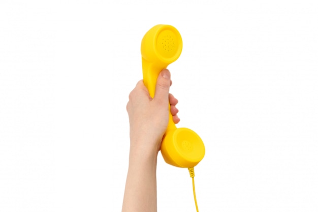 Yellow handset in woman's hand