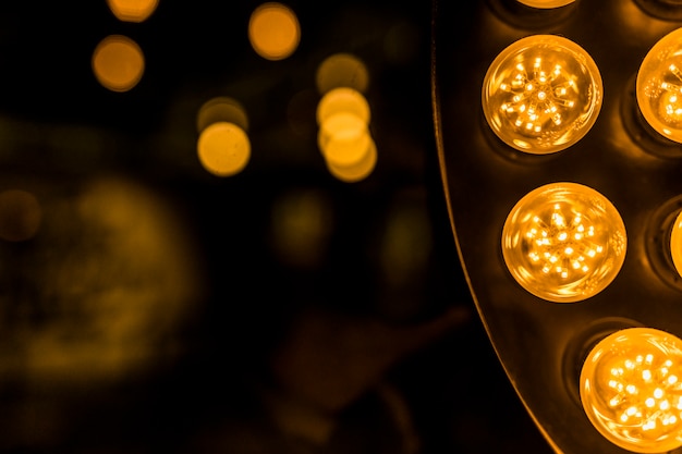 Photo yellow led light against bokeh backdrop