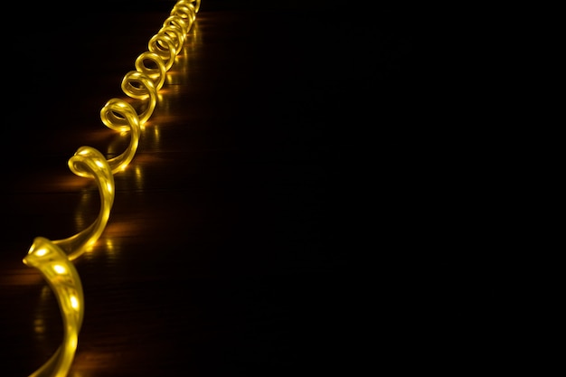 Yellow led strip on dark background with copy space