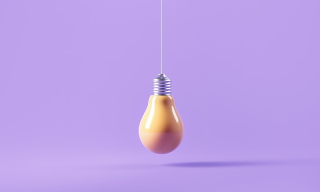 Yellow light bulb on purple background