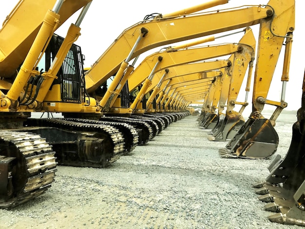 Photo yellow machineries on field