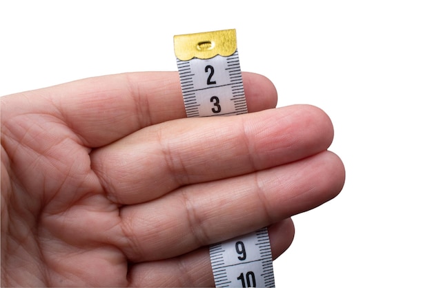 Yellow measuring tape isolated on white background