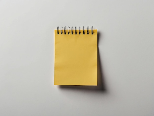 A yellow note on white surface