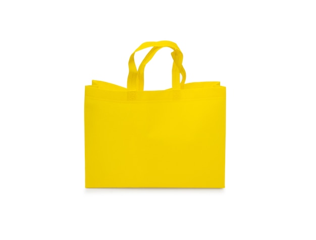 Yellow paper bag isolated on white background