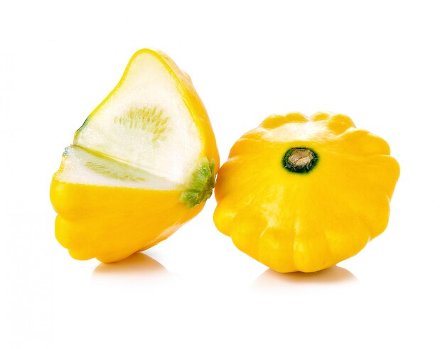 Yellow pattypan squash isolated on white.